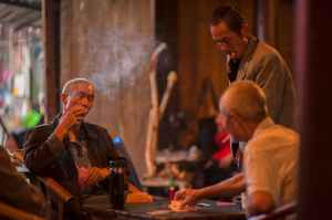 three people talking